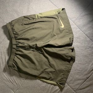7 inch Nike running shorts in black size Medium
